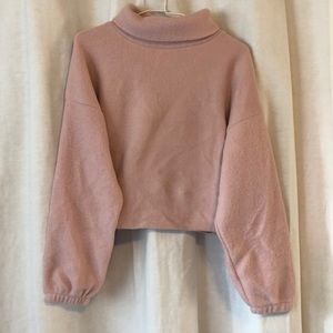 Pink fuzzy cropped turtleneck sweater